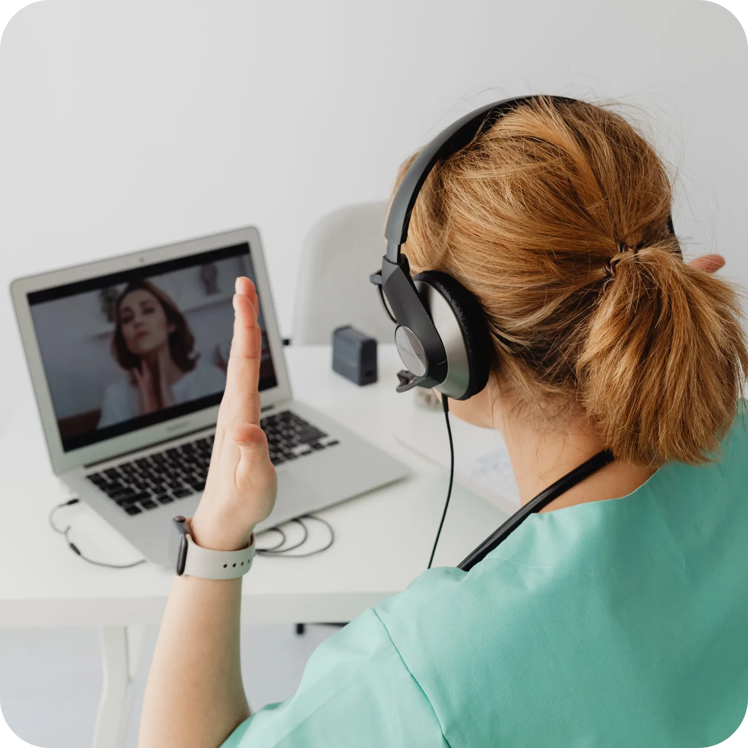 Health care employee consulting virtually